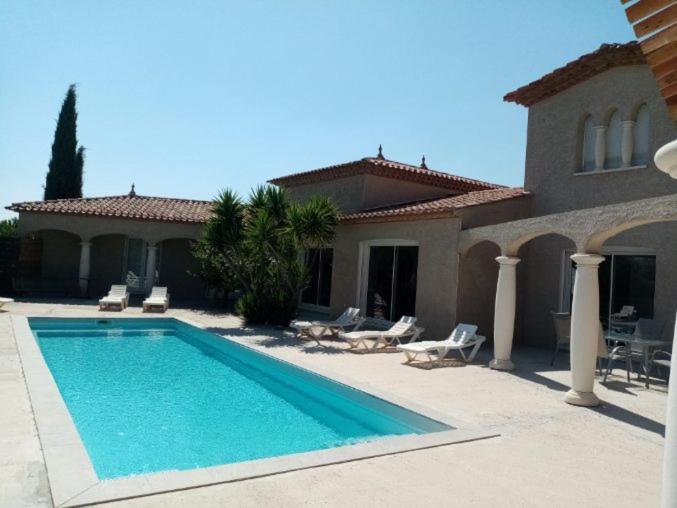 Bienvenue A L Hacienda Villa Magalas ภายนอก รูปภาพ